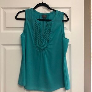 Market and spruce sleeveless blouse
